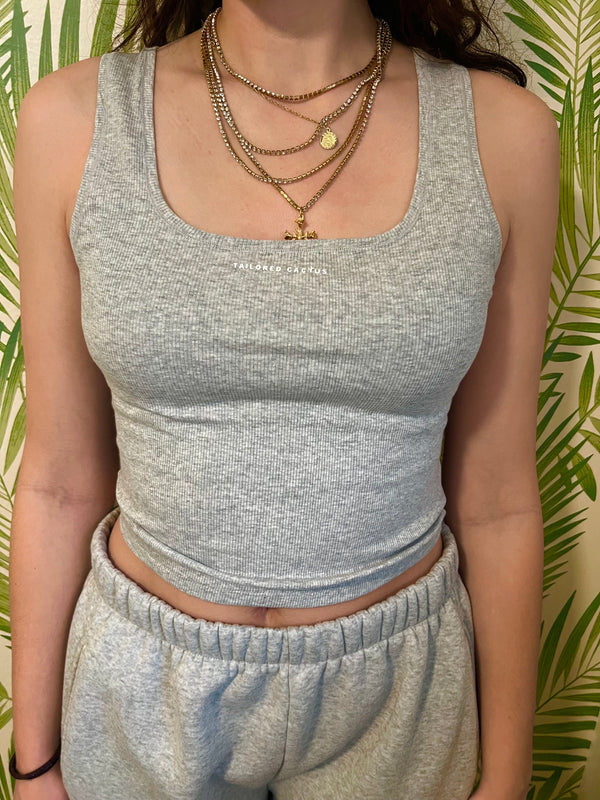 Tailored cactus girl in grey tank top and matching sweatpants