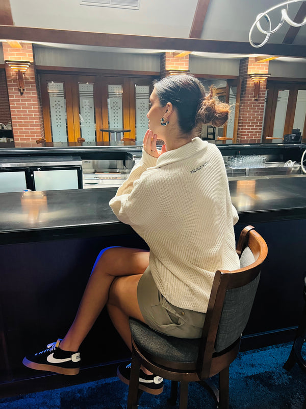 Tailored cactus girl in tan zip up sweater