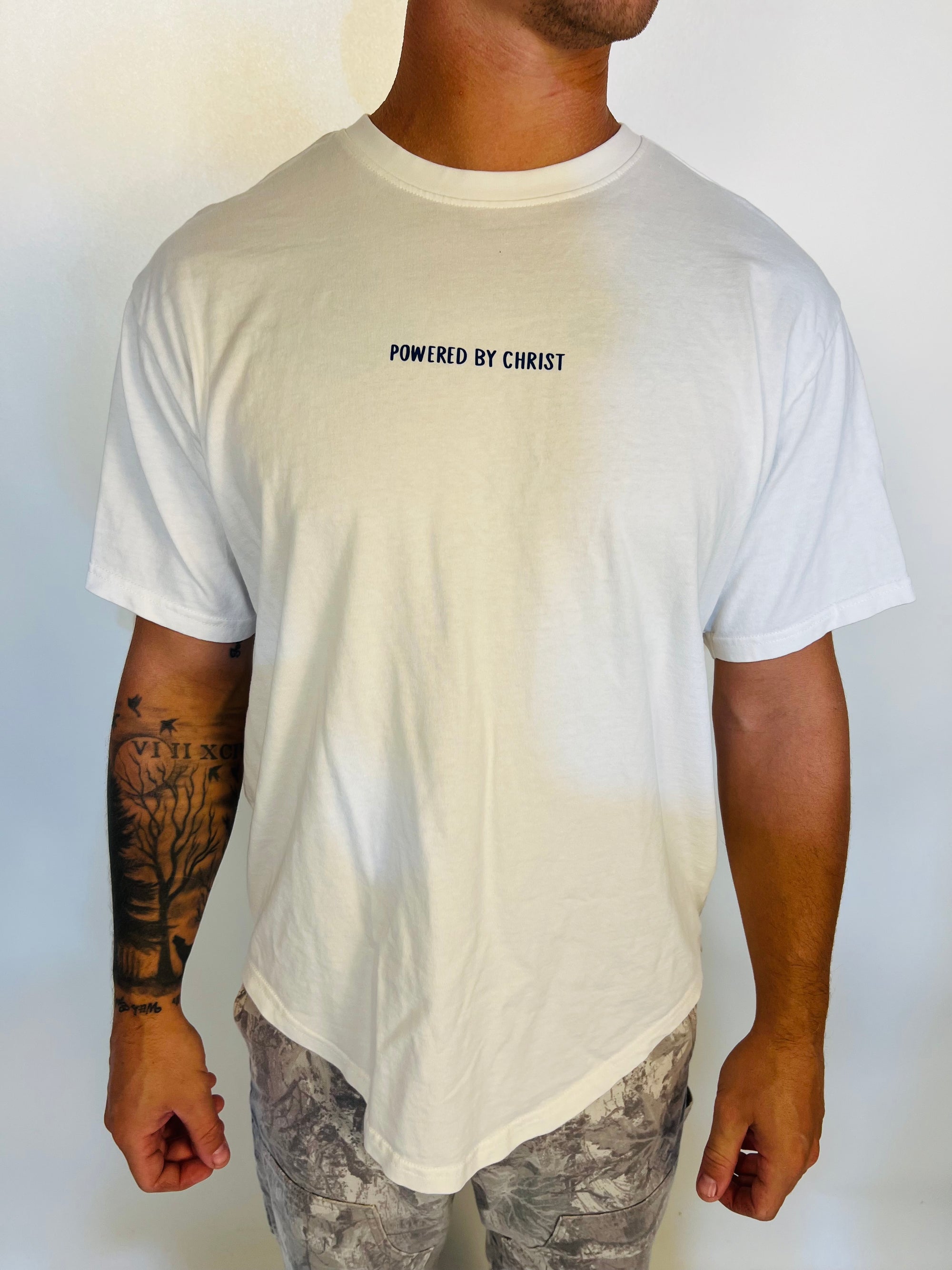 Man in tailored cactus powered by faith white t shirt