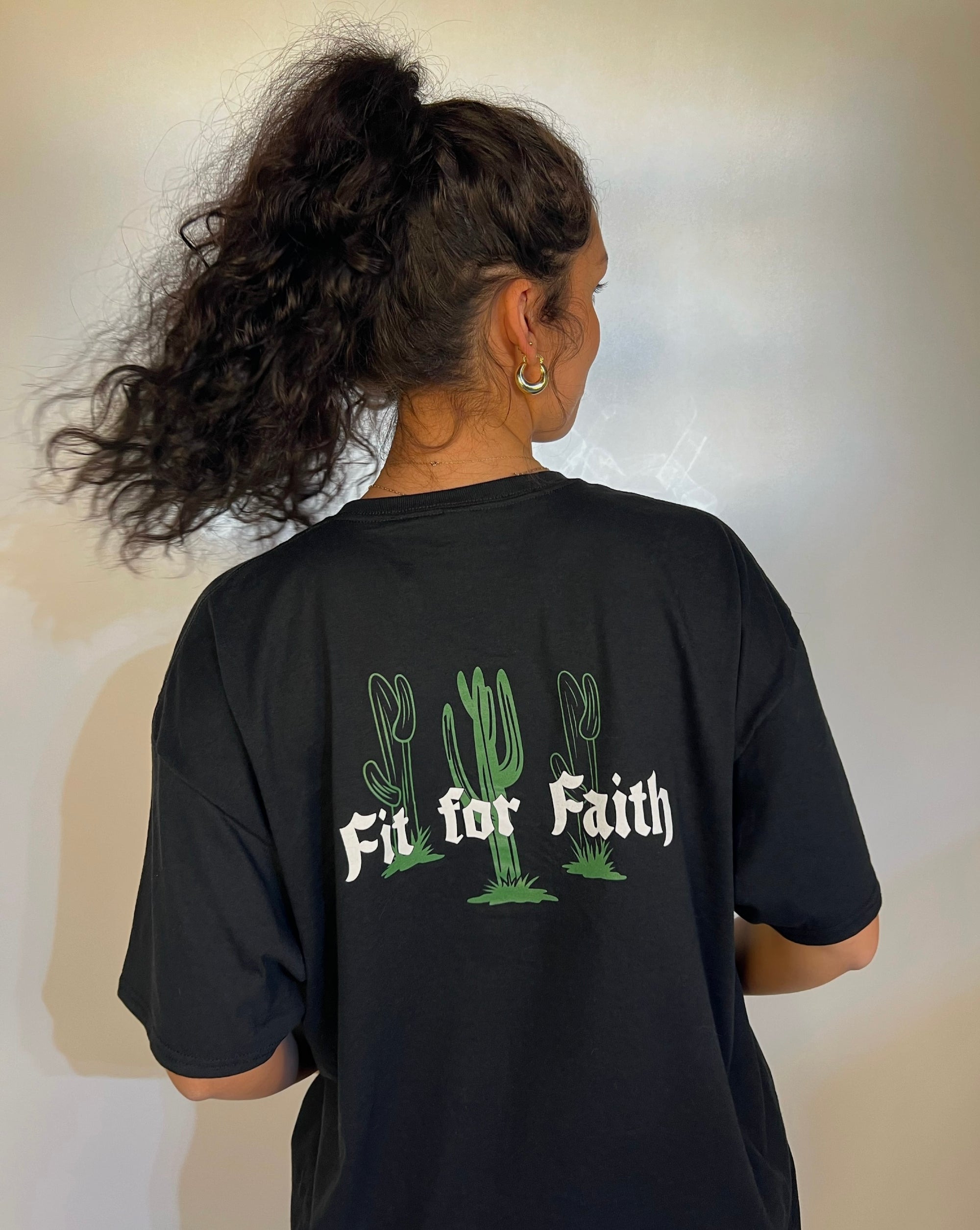 Tailored cactus girl in black t-shirt with fit for faith and cactus on back 