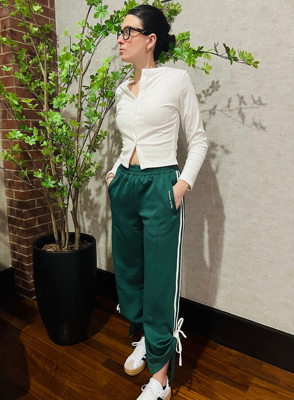 Tailored cactus girl in green pants with white bows 