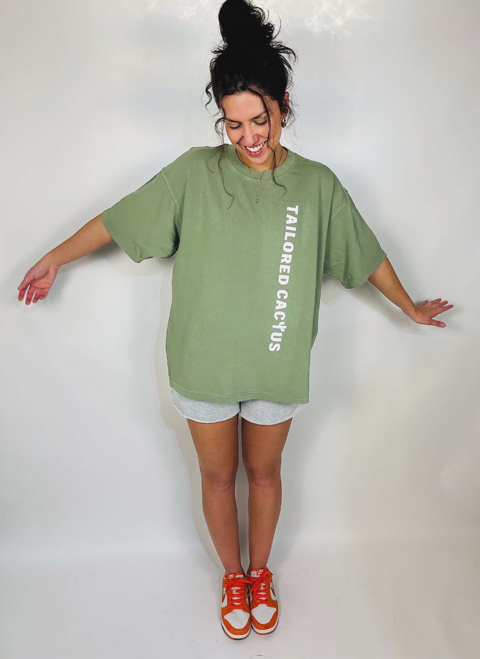 Tailored cactus girl in sage green tee shirt 