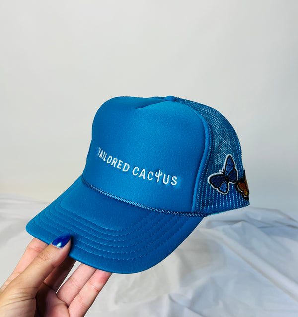 Tailored cactus blue butterfly trucker hat 