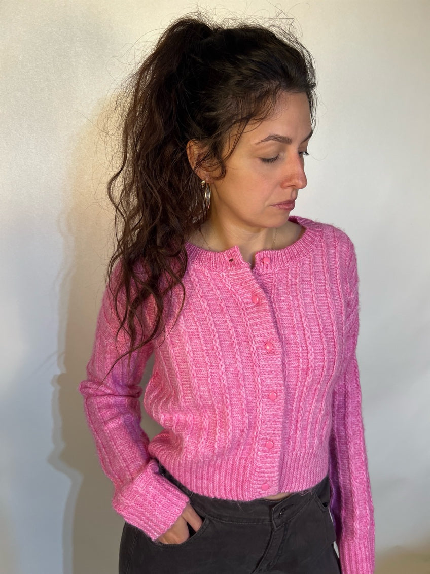 Girl wearing tailored cactus pink knit cardigan