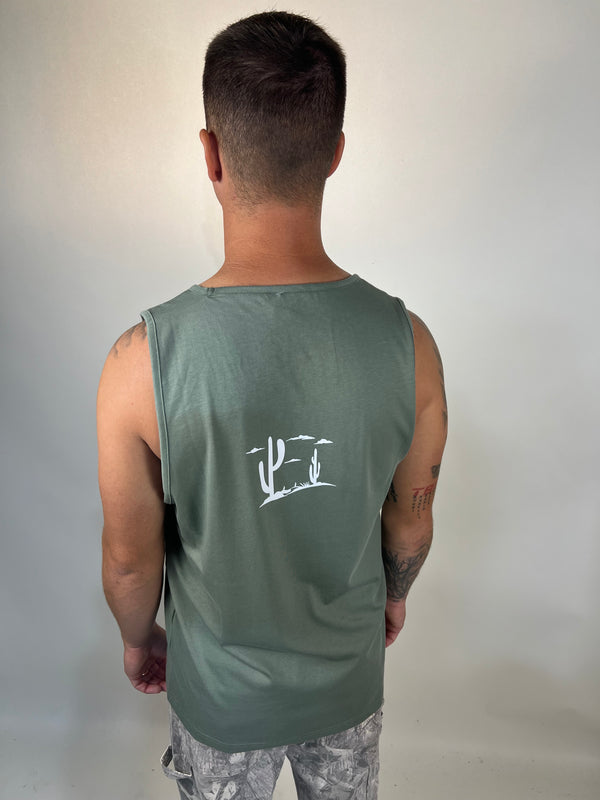 Man in tailored cactus green tank top