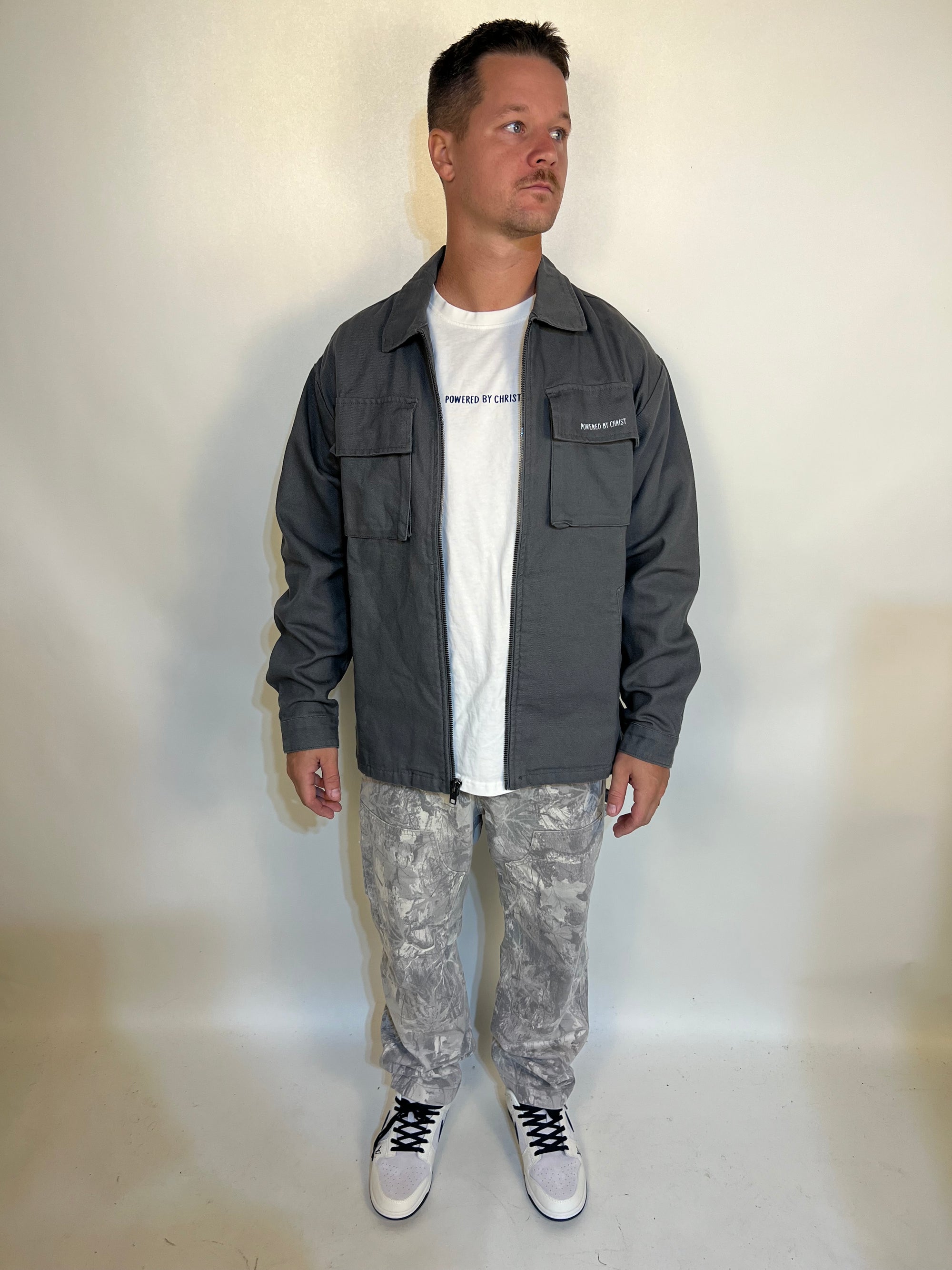 Man in grey ’powered by faith’ tailored cactus cargo jacket 