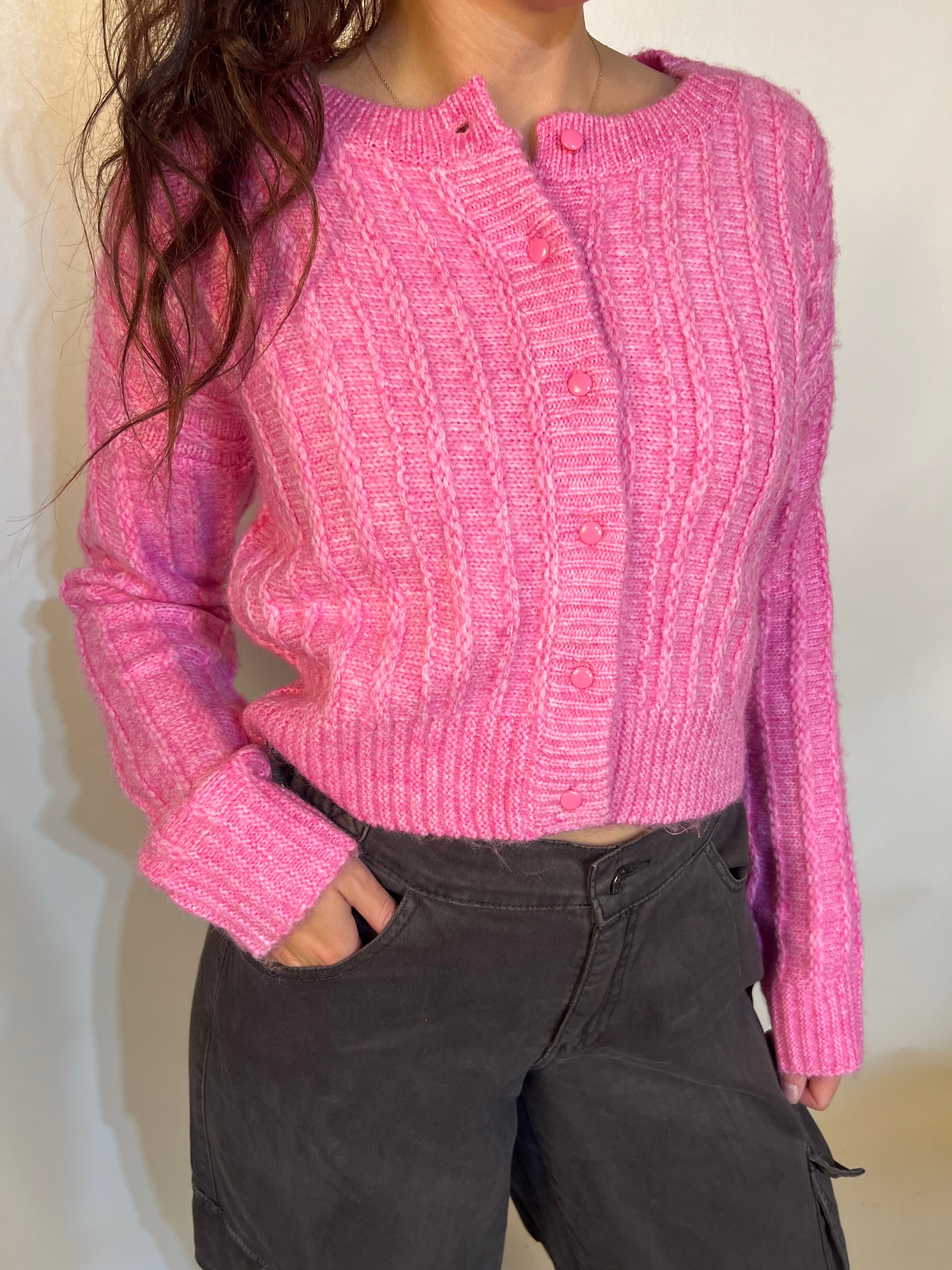 Girl wearing tailored cactus pink knit cardigan 