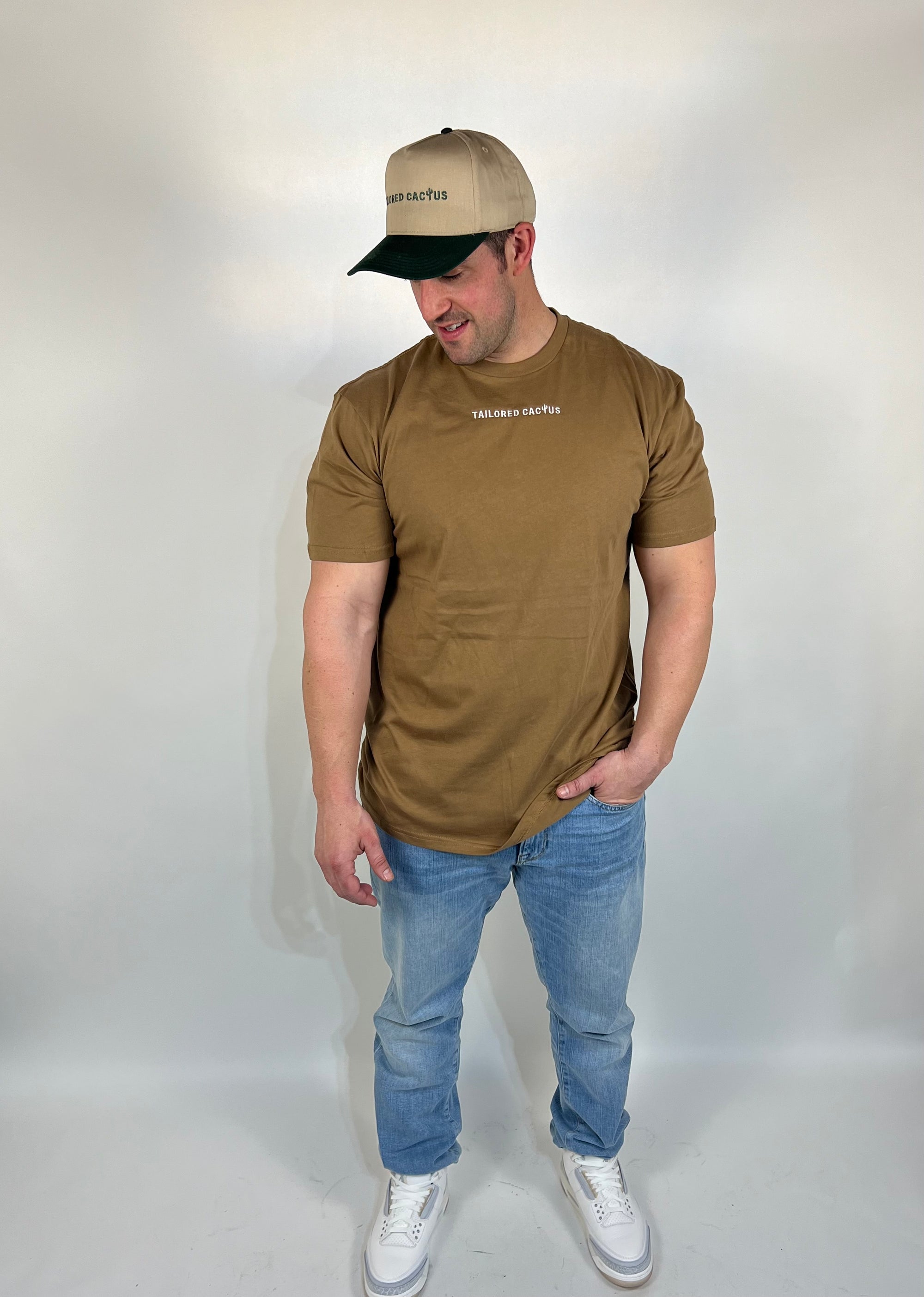 Tailored cactus man in tan tee shirt 