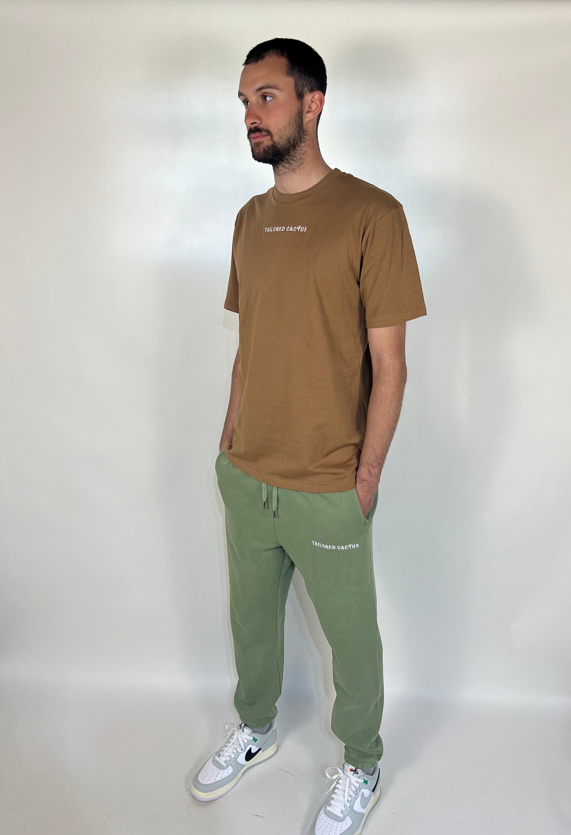 Man in tailored cactus tan t shirt 