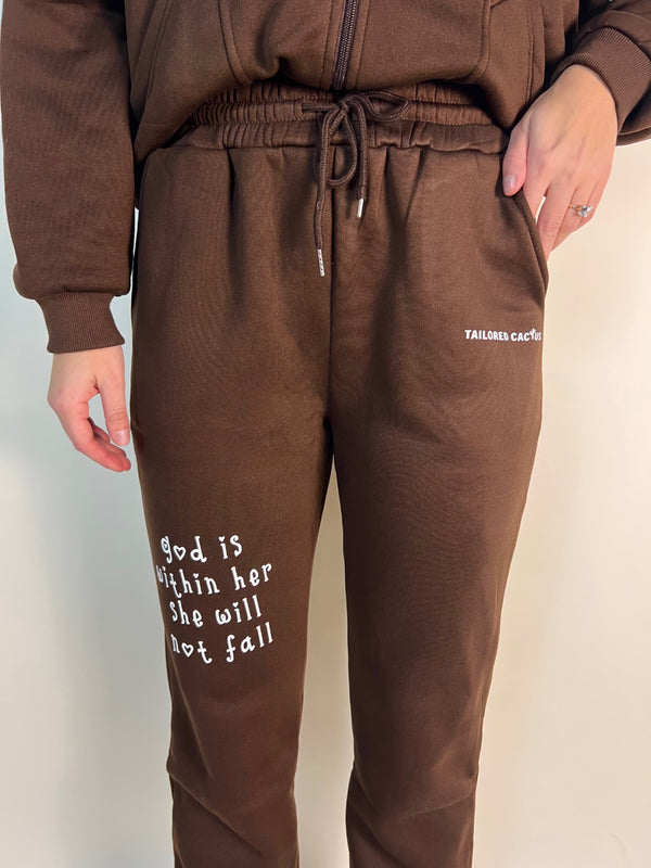 Tailored cactus God is within her brown sweatpants 