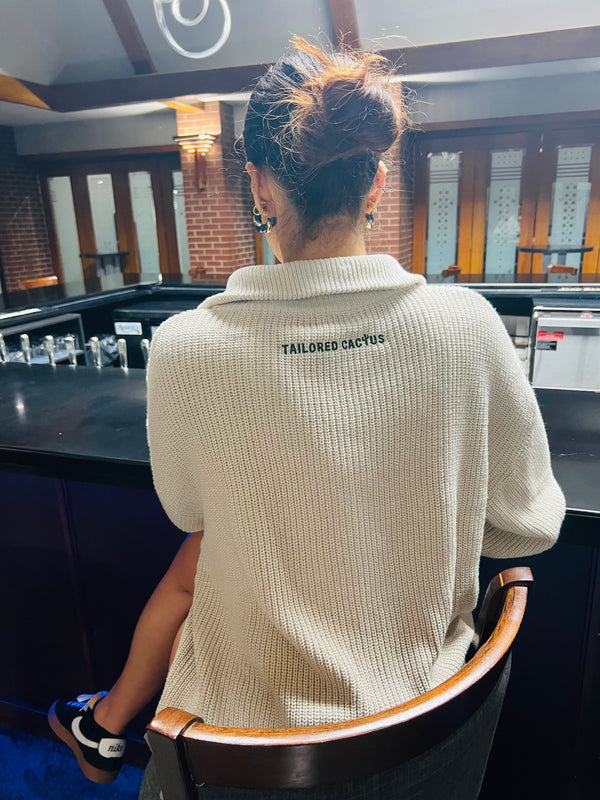 Tailored cactus girl in tan zip up sweater