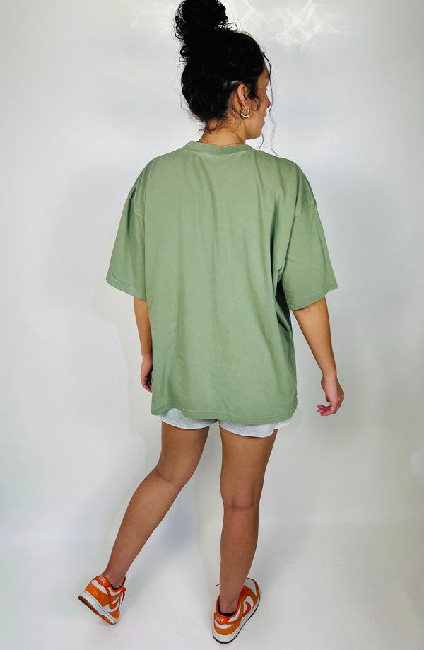 Tailored cactus girl in sage green t-shirt 