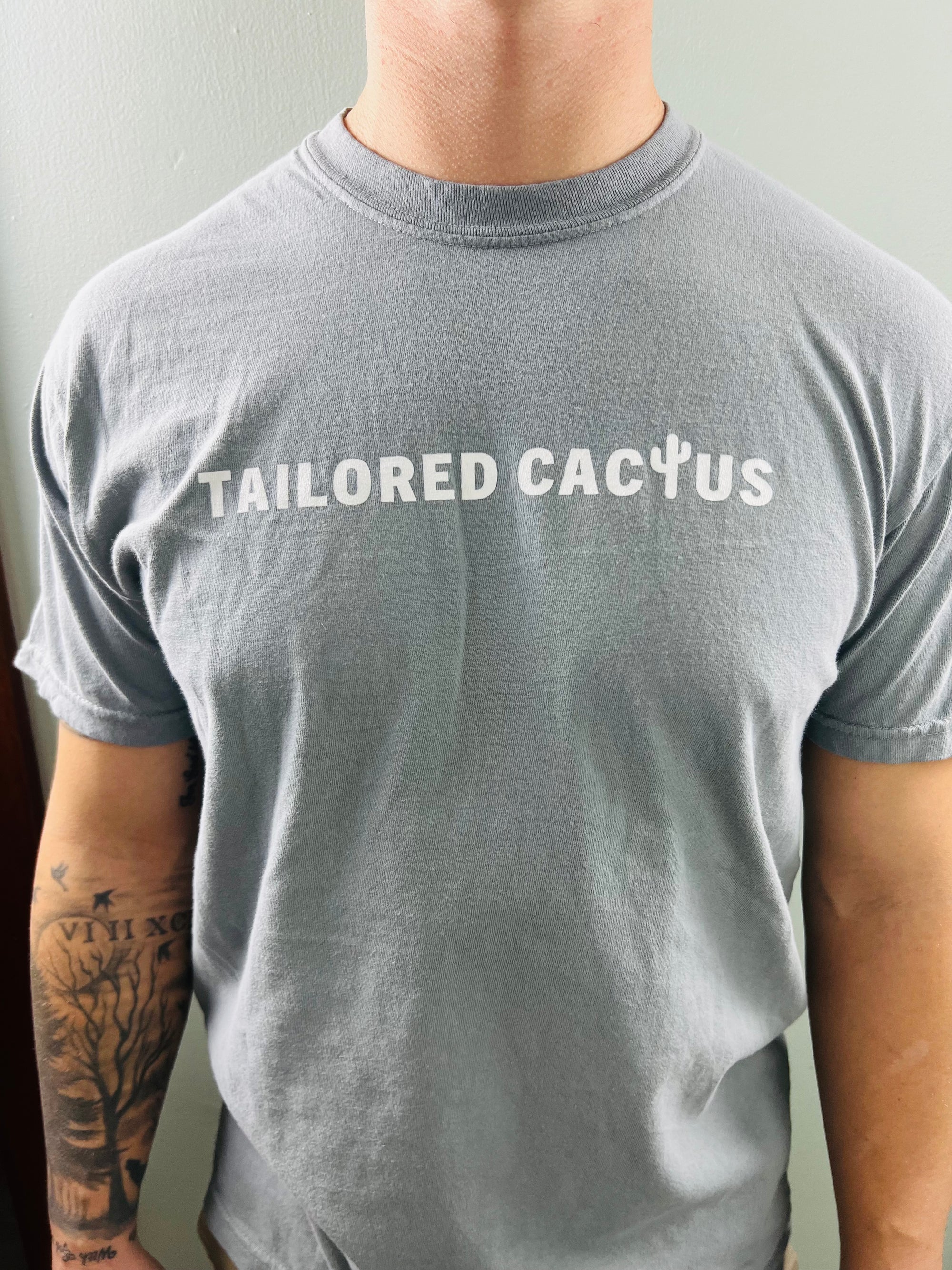 Tailored Cactus man wearing gray tee shirt